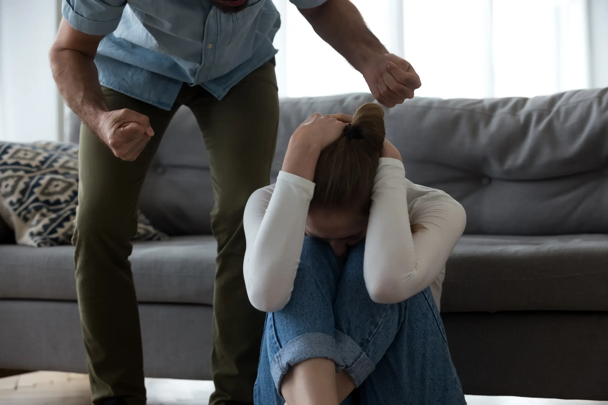 Abusive husband threaten crying wife, fear of domestic violence concept