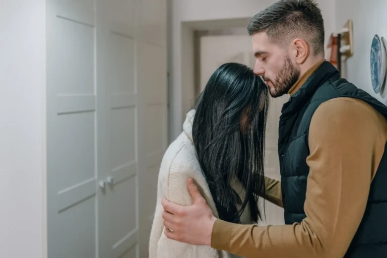 multicultural divorcing couple argues in hallway