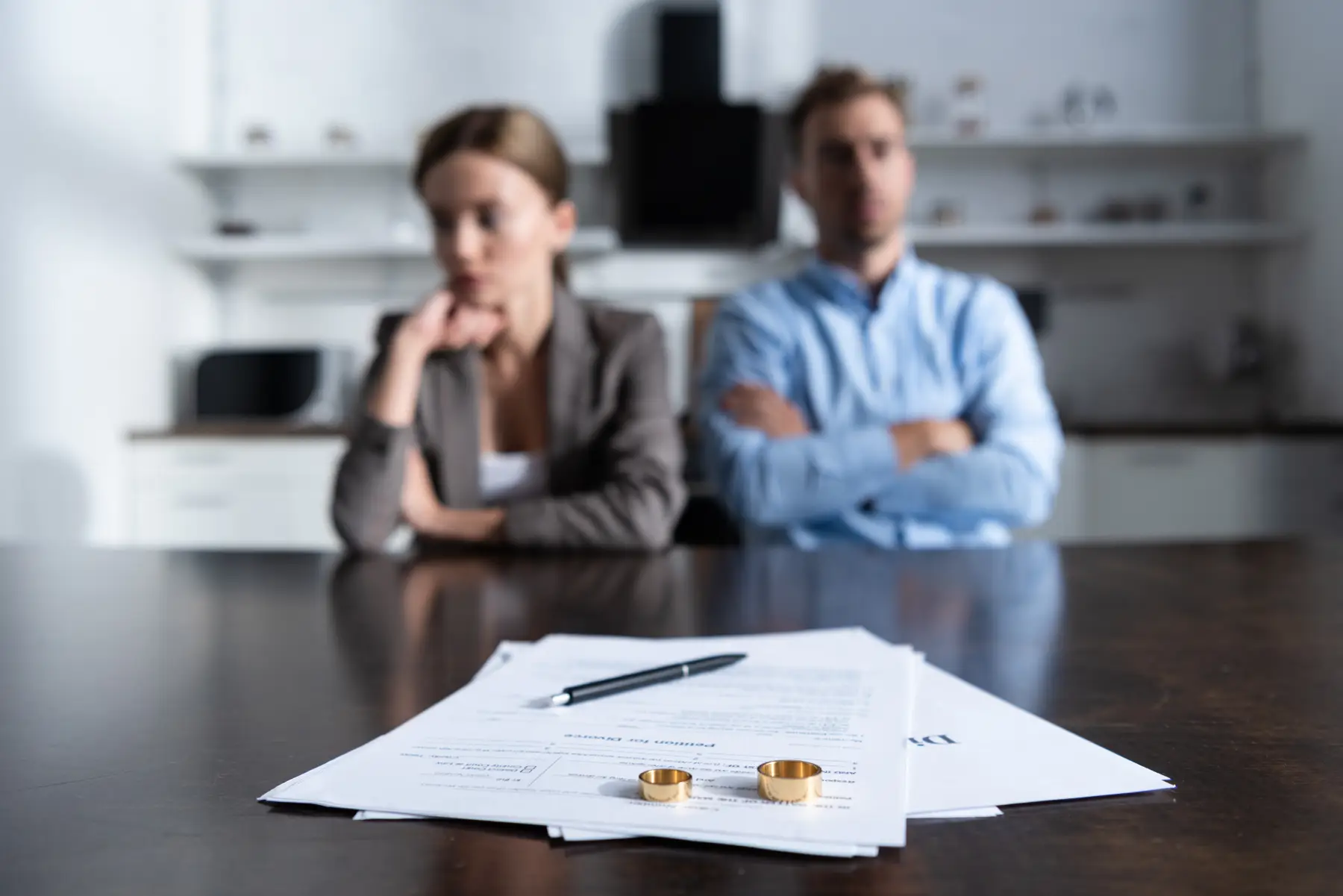 couple sits with divorce papers uncontested divorce washington