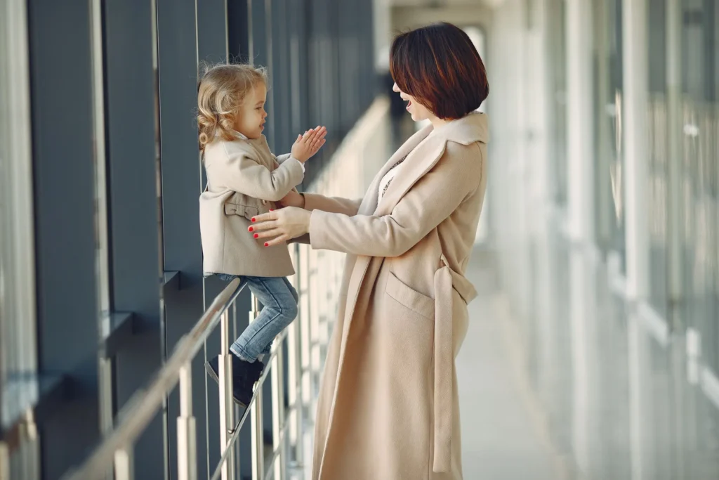 mother greets child at school pickup