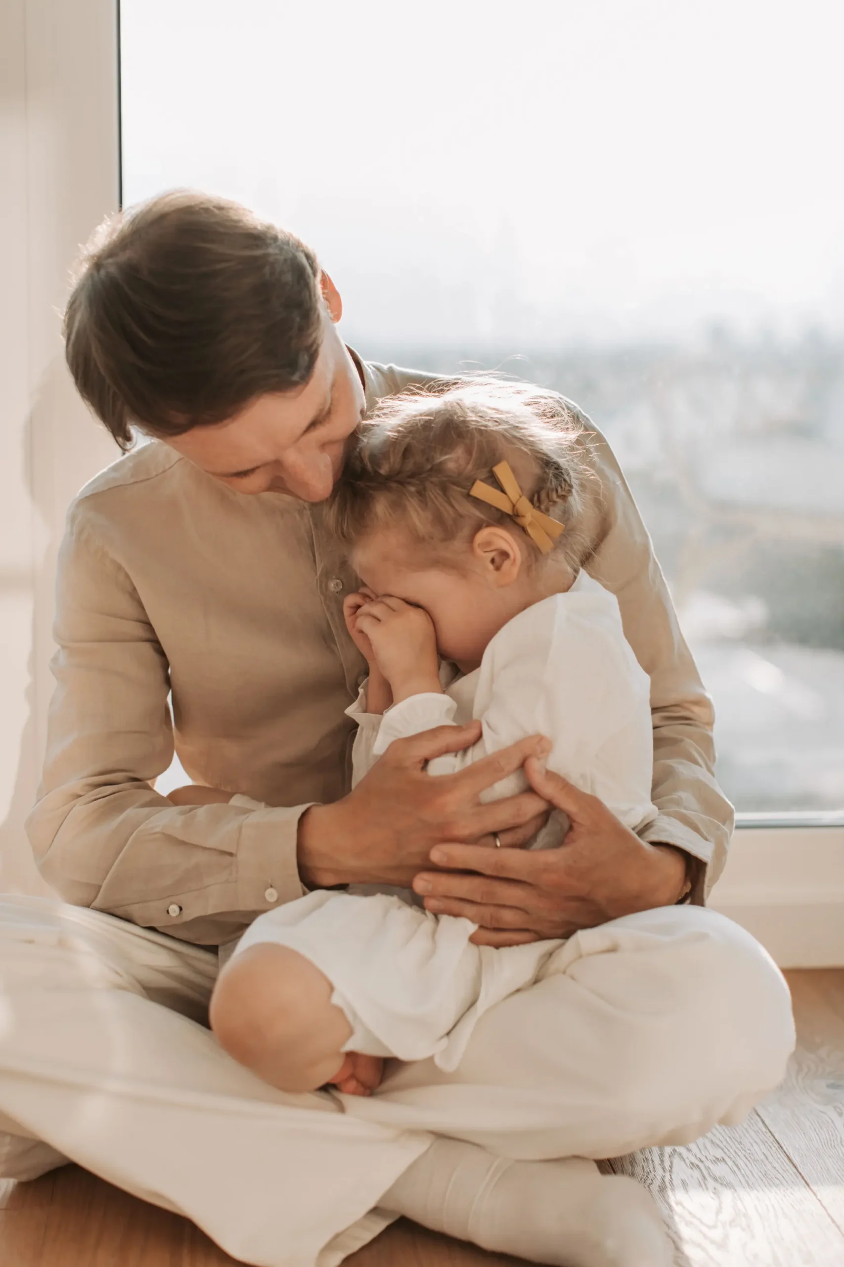 parent comforting a child after separation